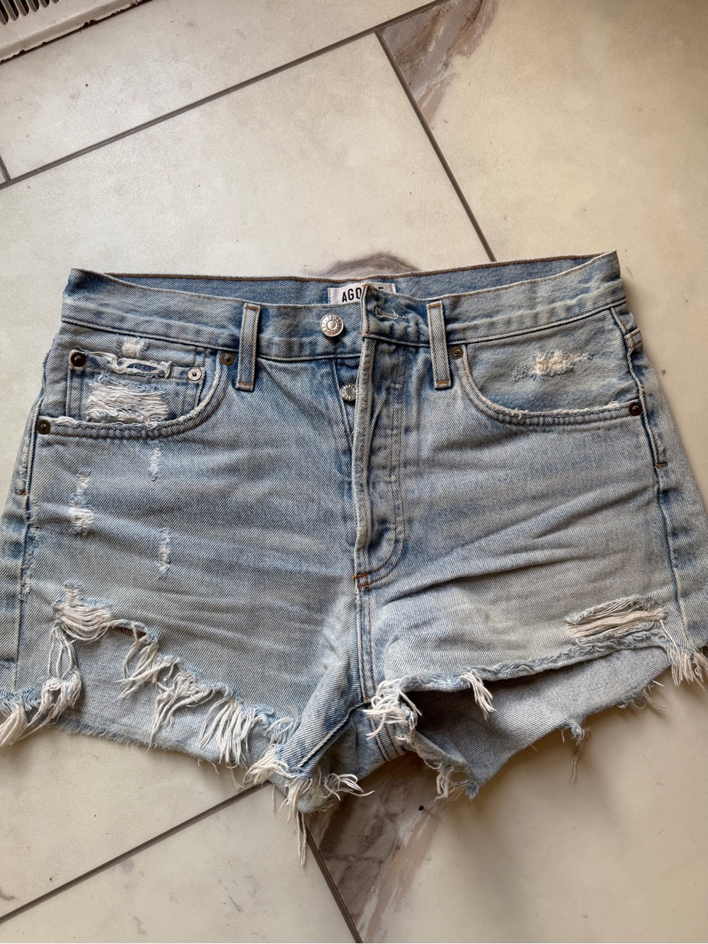 Agolde Light Wash Distressed Denim Cutoff Shorts
